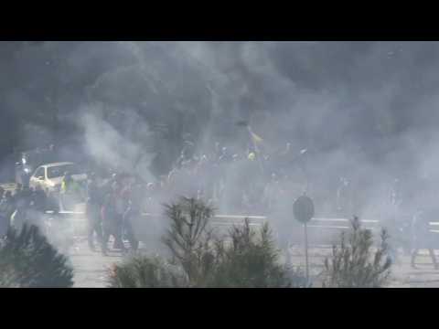 Protesters throw stones at riot police as Lesbos migrant camp protests intensify