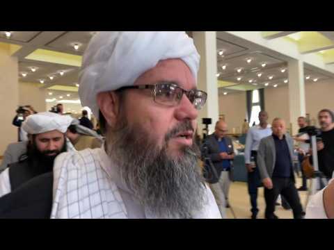 Taliban negotiator Shuhabuddin Dilawar arrives to sign US-taliban peace deal