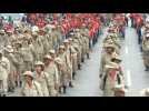 Pro-government demonstrators prepare to march in Caracas