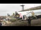 Scene of Turkish plane after it skidded off Istanbul runway killing three