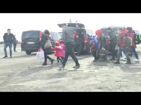Migrants rush to get buses in Istanbul heading for Greek border