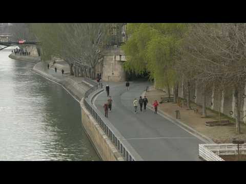 Banks of Seine deserted in Paris on first day of new lockdown