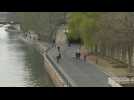 Banks of Seine deserted in Paris on first day of new lockdown