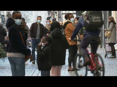 Pedestrians in centre of Rouen on first day of new French lockdowns