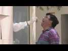 Indians at Covid-19 testing centre as infections hit new record