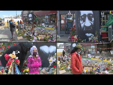 People gather at George Floyd Square in Minneapolis one day after guilty verdict