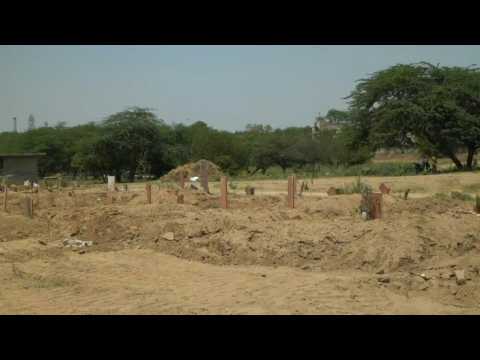Images of a graveyard in Delhi as Covid surge hits new record in India