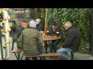 Londoners celebrate an easing of lockdown restrictions with morning pints at the pub