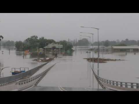 Bridge submerged as Australian flooding disaster worsens