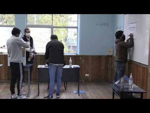 Vote count starts as polls close in Ecuador presidential runoff