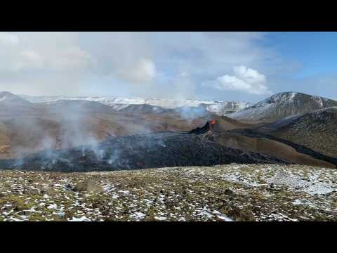 Glowing red lava spews from erupting volcano near Mt Fagradalsfjall