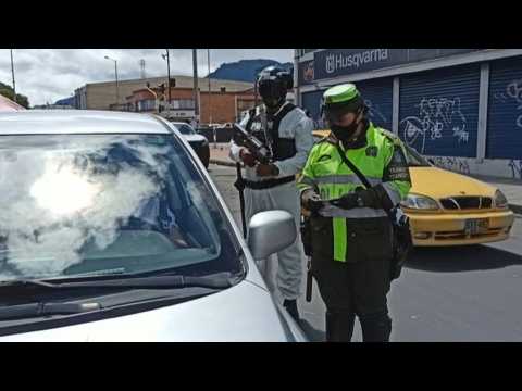 Checkpoints in Bogota as it raises COVID-19 alert level after spike