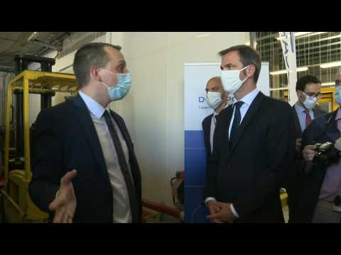 French health minister visits mask distribution depot