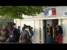In Paris, secondary school children go back to school wearing facemasks