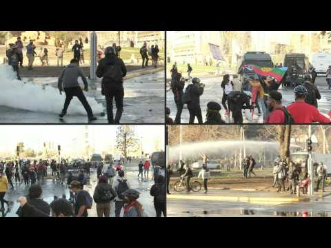 Chile police fire tear gas, water cannons to halt protest on coup anniversary
