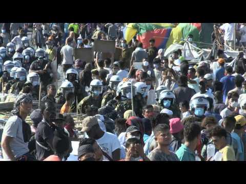Migrants demonstrate on Greece's Lesbos against plans to move camp after blaze