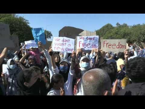 Moria fire: Migrants demonstrate against plans to move them to a new camp