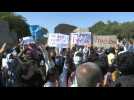 Moria fire: Migrants demonstrate against plans to move them to a new camp