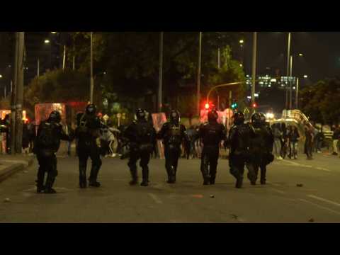 Protesters and police clash in Bogota on third night of police brutality protests