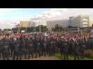 Belarus: thousands of protesters face riot police in capital Minsk