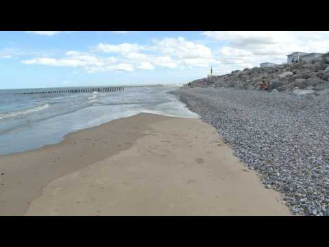 Pictures of a beach in Calais where the body of a Sudanese migrant was found