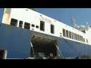 Soldiers unload aid from French ro-ro cargo ship at Beirut airport