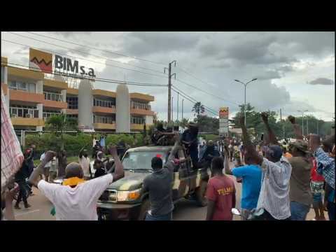 Malian anti-government protesters cheer on the military at Independence Square