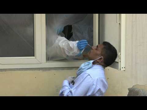 Delhi residents get swabbed as India virus cases pass 5 million