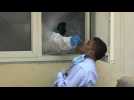 Delhi residents get swabbed as India virus cases pass 5 million