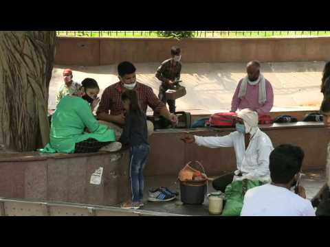 Images from Delhi as global coronavirus death toll nears one million