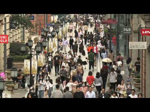 Busy streets in China's Wuhan as global Covid-19 toll nears a million