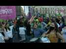 Argentine women hold up green scarves in demand for legal abortion