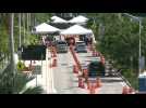 Miami: people line up at coronavirus testing site as cases surge in Florida