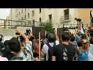 Lebanese protesters force open gate leading to parliament amid Macron visit
