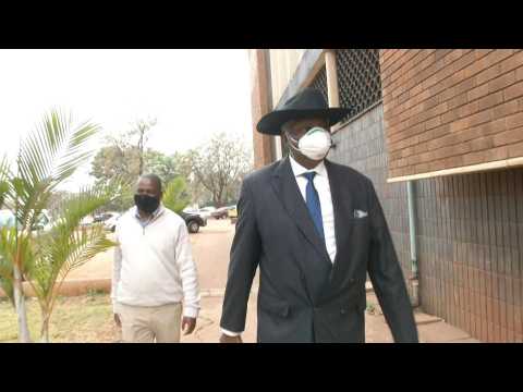 Mugabe's ex-former vice president Mphoko arrives at court for corruption trial