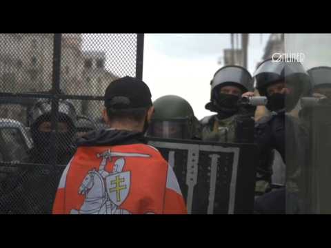 Protesters face police as tens of thousands join Belarus march against Lukashenko