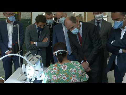 French PM Castex visits mask-producing workshop