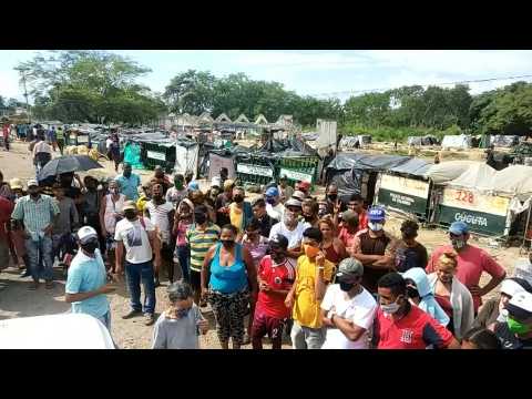 Venezuelans migrants wait at Colombian border camp to enter their country