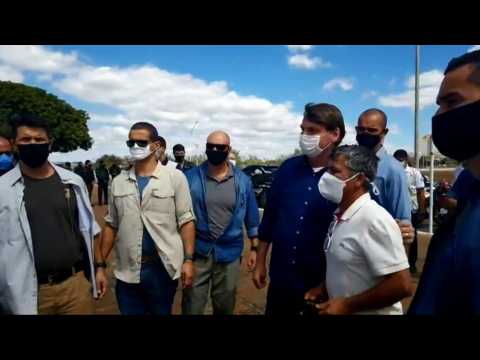 Brazil's Bolsonaro greets supporters after recovering from COVID-19