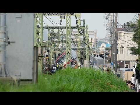One dead, 30 hurt as train, truck collide near Tokyo
