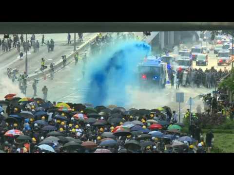 Hong Kong police fire tear gas, water cannon at protesters