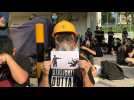 Sit-in at school of Hong Kong protester shot by police