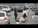 Pro-independence protesters block roads to Barcelona airport