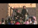Syrian regime forces in Tall Tamr as they move towards Turkish border