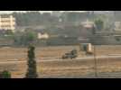 Smoke rises above Syrian town reportedly seized by Turkey and proxies