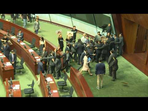 Opposition heckles lead Hong Kong leader to abandon policy speech