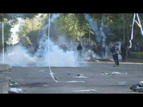 Protesters and police clash in Chile's capital for fourth day in a row