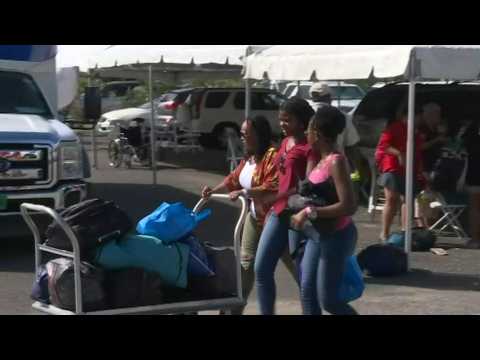 Nassau: families wait at Nassau airport as search for bodies continues