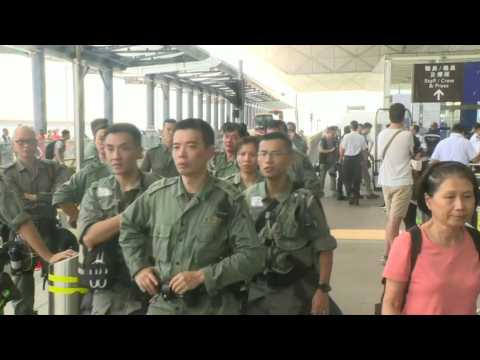 Riot police outside Hong Kong airport ahead of expected protest