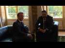 Emmanuel Macron greets Lebanese PM Saad Hariri